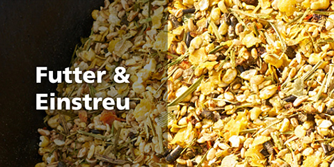 Nahaufnahme von hochwertigem Tierfutter und Einstreu aus Getreide und Samen für gesunde Tiere