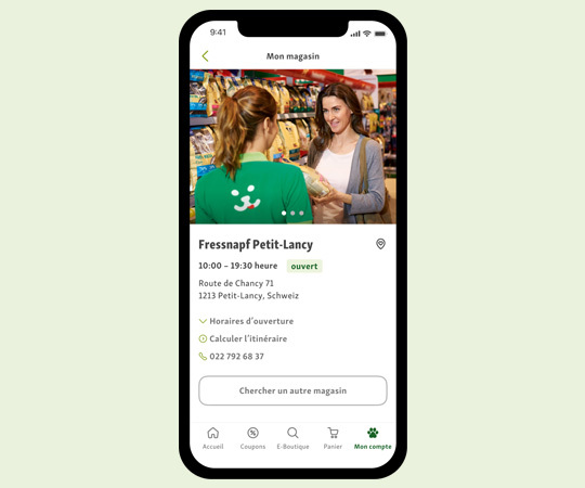 Écran de smartphone affichant les informations du magasin Fressnapf Petit-Lancy en Suisse avec horaires d'ouverture, adresse et contact.