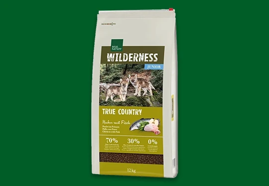 Real Nature Wilderness Junior True Country hondenvoer met 70 % vlees en vis, 12 kg zak met natuurlijk wildernisontwerp