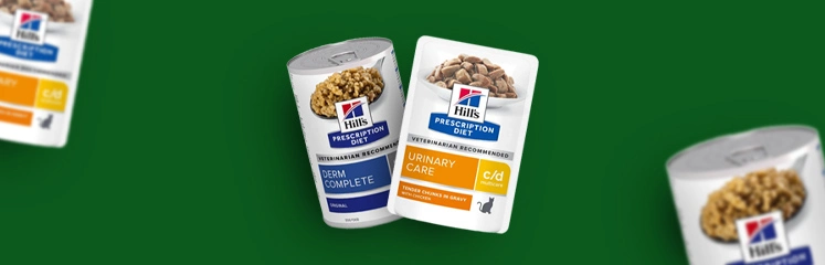 Deux boîtes de nourriture Hill's prescription Diet sur fond vert