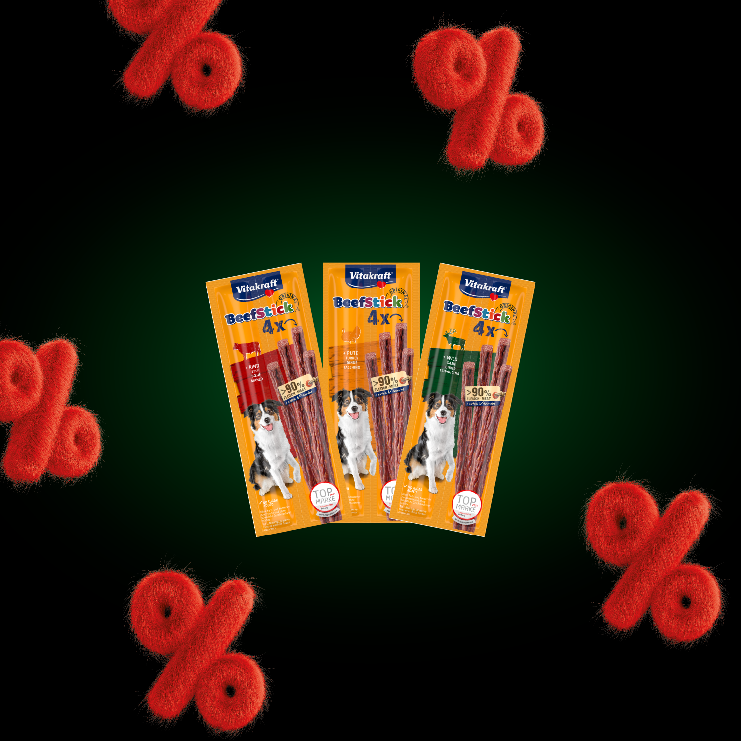 On voit ici trois paquets de friandises pour chiens « Beef Sticks » aux saveurs bœuf, dinde et gibier de la marque Vitakraft.