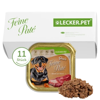 Hundfutterverpackung mit einem lächelnden Rottweiler, beschriftet mit "Gino's Feine Paté, Reich an Rind," mit 11 Portionen angegeben.