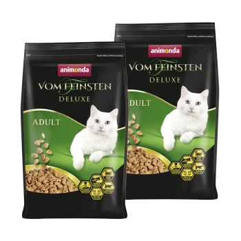 Dwie torby karmy dla kotów Animonda Vom Feinsten Deluxe dla dorosłych, z białym kotem na froncie i widocznymi chrupkami przez opakowanie.