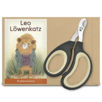 Ein Paar Haustier-Nagelschneider liegt neben einer Verpackung mit einem Cartoon-Löwen namens Leo Löwenkatz, beschriftet mit "Krallenschere."