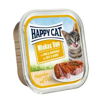 Verpackung von Happy Cat Minkas Duo Katzenfutter mit einer verspielten Katze, die sich die Lippen leckt, mit Text, der Rind- und Kaninchenzutaten angibt.