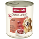 Boîte de nourriture pour chiens Animonda GranCarno Adult 1+ au bœuf, montrant des morceaux de viande et un golden retriever heureux.
