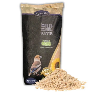 Eine Tüte Lyra Pet Wild Vogel Futter mit einer bunten Vogelillustration, beschriftet mit "100% natürlich" und "10 Jahren", mit Futter davor.