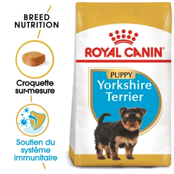 Sac de nourriture pour chiens Royal Canin Puppy Yorkshire Terrier mettant en vedette un petit chiot Yorkshire Terrier, avec un texte soulignant la nutrition de la race et le soutien immunitaire.