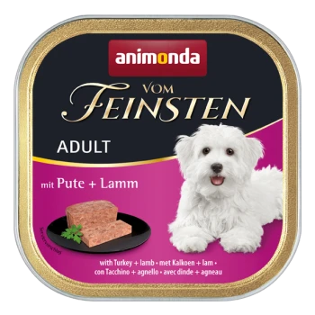 Une boîte de nourriture pour chien Animonda Vom Feinsten pour adultes, présentant un chien blanc et étiquetée "mit Pute + Lamm" (avec dinde + agneau).