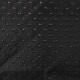Nahaufnahme eines strukturierten schwarzen Stoffes mit erhabenen runden Punkten, der ein schlankes und modernes Design zeigt, geeignet für Haustierzubehör.