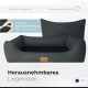 Ein dunkelgraues Haustierbett mit abnehmbarem Bezug, mit einem Logoetikett, das "Freudentier" liest und Text, der "Herausnehmbares Liegekissen" angibt.