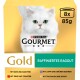 Die Verpackung von Purina Gourmet Gold Katzenfutter zeigt eine flauschige weiße Katze und Geschmäcker: Huhn & Karotten, Rind & Tomaten, Lamm & grüne Bohnen, Pute & Spinat.
