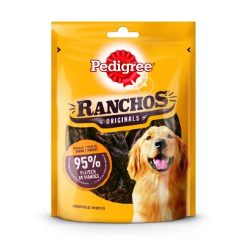Verpackung von Pedigree Ranchos Originals Hundeleckerlis mit einem lächelnden Golden Retriever und auffälligen Etiketten: "95% Fleisch de Viandes" und "Reich an Huhn."