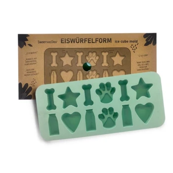 Silikon-Eiswürfelform in mintgrün mit Formen wie Knochen, Sternen, Herzen und Pfotenabdrücken, mit Verpackung, die "SmoothieDog" beschriftet ist.
