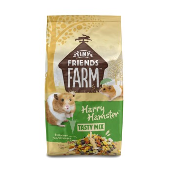 Tiny Friends Farm Harry Hamster Tasty Mix pet food bag with hamster images and 700g weight.