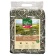 Eine klare Tüte mit grünem Heu, beschriftet mit "REAL NATURE NAGER & ZIERKANINCHEN", mit Symbolen für Premiumqualität und Eignung für Kleintiere.