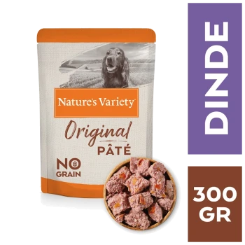 Nourriture pour chiens Nature's Variety Original Pâté, 300g, avec un chien souriant sur l'emballage, étiqueté "Sans céréales" et "Dinde."