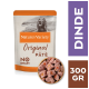 Nourriture pour chiens Nature's Variety Original Pâté, 300g, avec un chien souriant sur l'emballage, étiqueté "Sans céréales" et "Dinde."