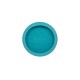 Eine runde, türkisfarbene LickiMat UFO-Fütterungsmatte für Haustiere mit einer strukturierten Oberfläche aus kleinen Erhebungen, entworfen, um Haustiere während der Fütterung zu beschäftigen.