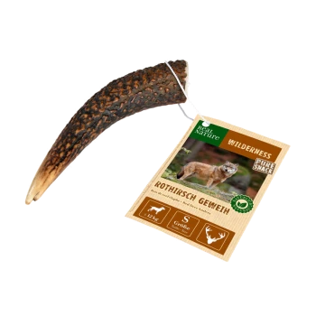 Een rode hertengewei hondenkauwsnack met een label 'Real Nature Wilderness Pure Snack - Rothirsch Geweih,' geschikt voor honden onder de 12 kg.
