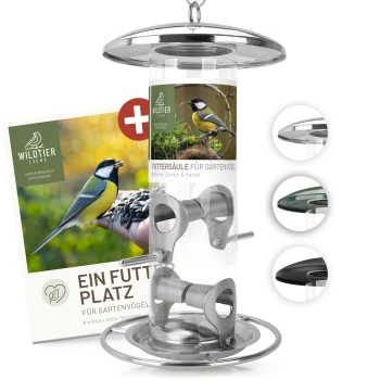 Vogelfutterspender mit einem transparenten Rohr, einem Metallboden und drei austauschbaren Oberteilen, mit einem Etikett, das ein Vogelbild und Text auf Deutsch zeigt.