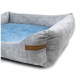 Graues Haustierbett mit einem weichen blauen Innenraum und einem braunen Etikett mit der Aufschrift 'REXPRODUCT.COM' an der Seite.