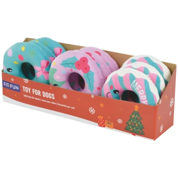 Box of colorful plush donut dog toys in holiday display box labeled "FIT+FUN" and "TOY FOR DOGS"