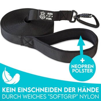 Schwarze Hundeleine mit einem weichen Griff, mit einem Karabinerclip und dem Text 'HUND IST KÖNIG' und 'KEIN EINSCHNEIDEN DER HÄNDE.'