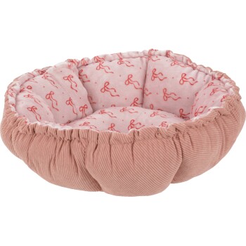 Panier rond en velours côtelé rose avec bords froncés et intérieur en peluche rose pâle imprimé de petits motifs de nœuds rouges