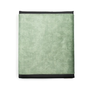 Ori Abdeckung grün XL Ein weiches, grünes Haustierbett mit einem schwarzen Boden, das eine plüschige Textur und ein einfaches, modernes Design aufweist.