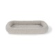 A soft, rectangular pet bed in light gray with plush, fluffy edges and a quilted center, ideal for small to medium pets.