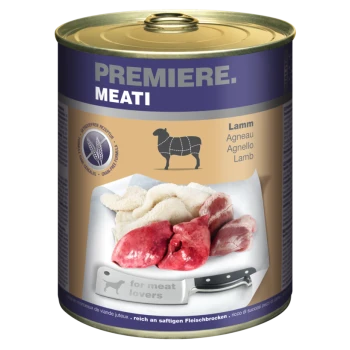 Dose Hundefutter mit der Aufschrift "Premiere. Meati", die Lammfleischstücke zeigt, mit einem Messer und dem Text "für Fleischliebhaber" auf der Verpackung.