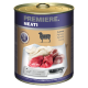 Dose Hundefutter mit der Aufschrift "Premiere. Meati", die Lammfleischstücke zeigt, mit einem Messer und dem Text "für Fleischliebhaber" auf der Verpackung.