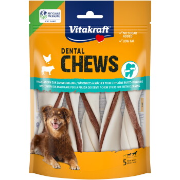 Paquet de friandises Vitakraft Dental Chews pour chiens avec bâtonnets torsadés et photo d'un chien ; texte visible : Sans sucre ajouté, Faible en matières grasses