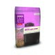 Sac de nourriture pour chien ACANA Singles Formula à base d'agneau nourri à l'herbe, avec un design violet comportant des images d'agneau et de pommes, ainsi que des allégations nutritionnelles.