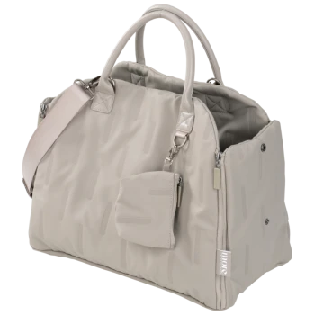 Beige zachte draagtas voor huisdieren met handvatten, schouderriem, voorvak en een "more" label aan de zijkant.