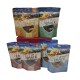 Assortiment DeliBest Cat Smack verpakkingen met smaken zoals kip, hert en konijn, elk met 93,7% vleesinhoud en zonder toegevoegde suiker.