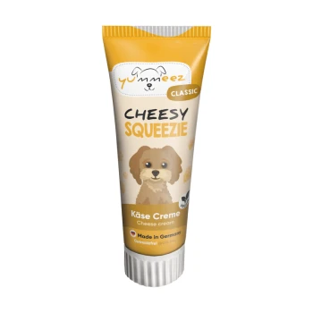 Cheesy SQUEEZIE 12x75g Eine Tube "Cheesy Squeezie" Käsecreme für Hunde, mit einem Cartoon-Hund auf dem Etikett, mit Text, der anzeigt, dass sie getreidefrei und in Deutschland hergestellt ist.