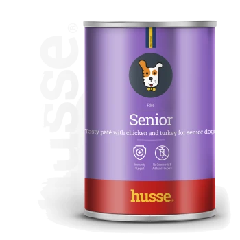 Lila Dose mit Hundepâté mit der Aufschrift 'Senior' mit Huhn und Truthahn, mit Immununterstützung und ohne künstliche Aromen. Marke: husse.