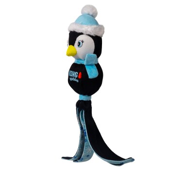 KONG Wubba penguin dog toy wearing a blue winter hat and scarf with long dangling legs and snowflake pattern.