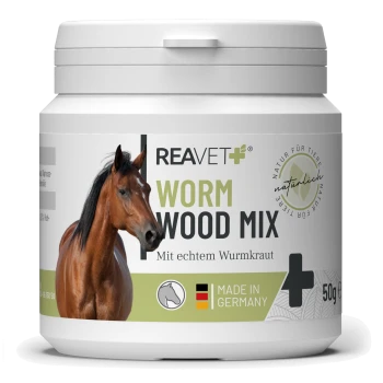 Behälter mit REAVET+ Wurmholz-Mix für Pferde, mit einem Bild eines braunen Pferdes, beschriftet mit 'Mit echtem Wurmkraut' und 'Hergestellt in Deutschland.'