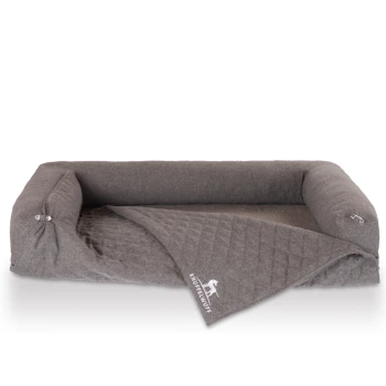 orthopädisches 2in1 Sofaschutz Hundebett Yona grau XL Graues Haustierbett mit einer gesteppten Decke, mit einem erhöhten Rand und dem Markennamen "KNUFFELWUFF" auf der Seite gestickt.
