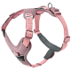 Rosa Hundegeschirr mit verstellbaren Riemen und gepolstertem Brustbereich, mit einem Metall-D-Ring zur Leinenbefestigung.