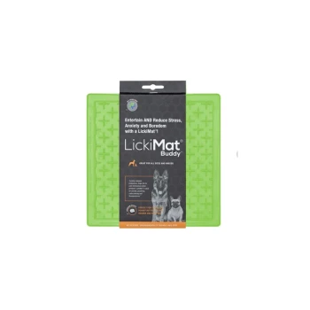 Green LickiMat Buddy for dogs, featuring a textured surface for spreading treats, with packaging stating it reduces stress and boredom.