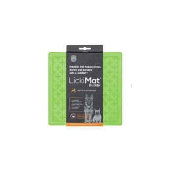 Green LickiMat Buddy for dogs, featuring a textured surface for spreading treats, with packaging stating it reduces stress and boredom.