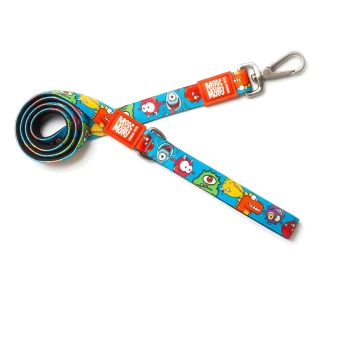 Bunte Hundeleine mit Cartoon-Monster-Designs und „Max & Molly Urban Pets“-Etiketten auf weißem Hintergrund.