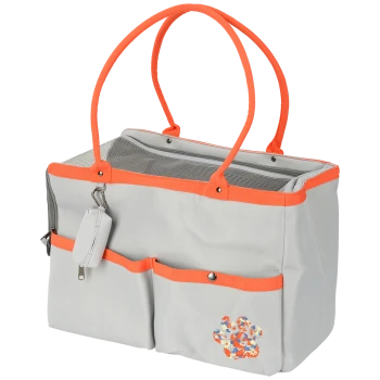 Grijze huisdierdrager met oranje handvatten, gaas bovenkant en een bloemenpootafdruk ontwerp, met twee voorzakken en een afneembare tas.