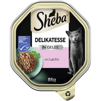 Delikatesse in Gelee 22x85g Lachs Sheba Delikatesse Katzenfutter in Gelee mit Lachs, mit einer grauen Katze auf dem Etikett, 85 g, und einer Zertifizierung für nachhaltige Meeresfrüchte.