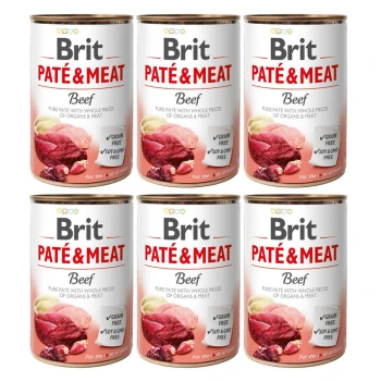 Sześć puszek karmy dla psów Brit Paté & Meat, oznaczonych "Wołowina", z obrazami surowego mięsa i notatką stwierdzającą "Bez zbóż, bez soi i GMO."