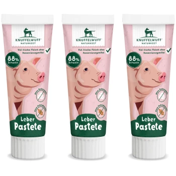 Drei Tuben Knuffelwuff Leberpaste für Haustiere, mit einer Schweineillustration, mit "88% Schwein" und "Leber Pasteete" deutlich angezeigt.
